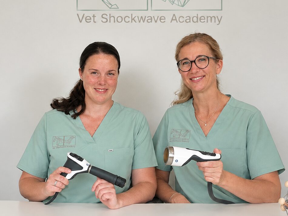 Dr Elisabeth Binder and Dr Karen Barker-Benfield holding a radial and a focused handpiece